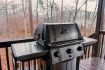 Enjoy grilling out on the lakefront deck at Ma Cook Lodge